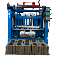 Machine automatique de fabrication de pavés en béton creux, de blocs de pavage et de briques de ciment - Prix
