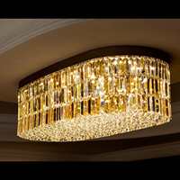 Lustre en cristal ovale argenté de luxe moderne encastré lumière blanche chaude lampe centrale pour villa décoration intérieure technologie CCT