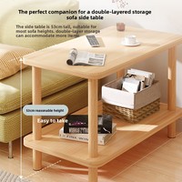 Petite table basse en bois moderne et minimaliste pour salon d'appartement avec étagère de rangement