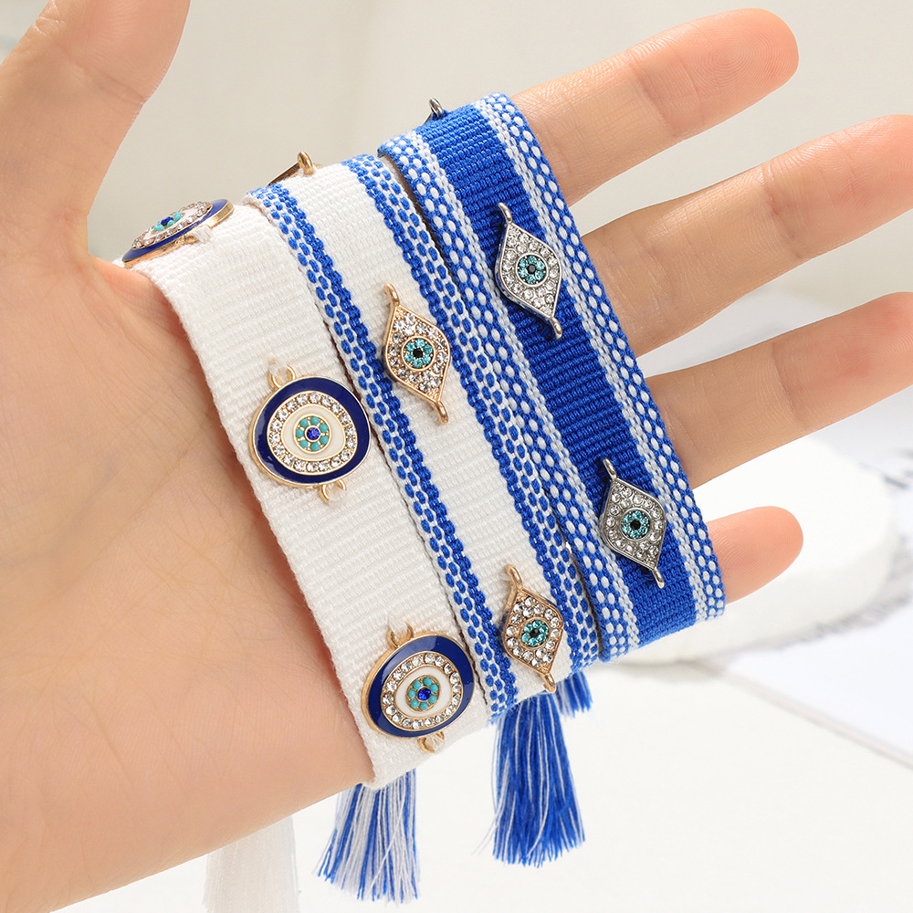 DGRIEKLA Braccialetto dell'amicizia in tessuto con occhio di malocchio, realizzato a mano, regolabile, con nappa, regalo per donne e ragazze, un elegante talismano di protezione e buona fortuna, 3.5