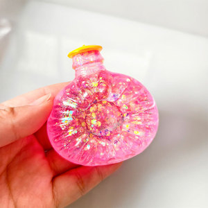 Juguete Antiestrés de TPR con Forma de Botella de Perfume, con Polvo Dorado, para Regalo - Product Image 6