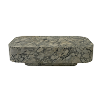 Table basse en marbre texturé naturel de luxe et unique dans le salon Table basse en marbre