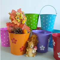 Vente en gros mini pot de fleur seau en métal seaux de peinture en fer idéal pour la décoration de Pâques stockage de bonbons et pinceau de teinture