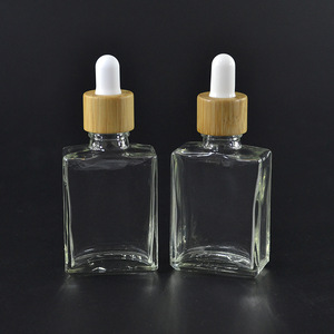2023 botellas de vidrio de aceite esencial de vidrio, cuadradas, planas, con tapa de gotero de bambú de 30ml - Product Image 2