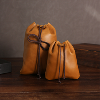 Porte-monnaie unisexe rétro en cuir véritable, pochette portable à cordon pour pièces de monnaie, clés, cartes, écouteurs, etc.