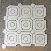 Mosaïque de marbre blanc de Thassos (Grèce) découpée au jet d'eau pour mur d'ambiance intérieur et carrelage de sol