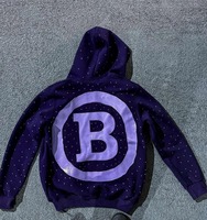Sweat à capuche zippé surdimensionné en molleton de coton, avec broderie de motifs, effet vieilli, orné de strass et de cristaux, en satin