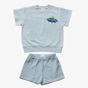 Novo produto conjunto de roupas estampadas para bebês meninos e meninas com estampa de nave espacial de explosão legal