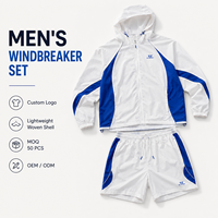 Conjunto Deportivo de Dos Piezas para Hombre: Chaqueta Ligera con Capucha y Cremallera Completa en Bloques de Color y Pantalones Cortos con Rayas Gruesas y Mangas Raglán