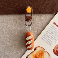 Porte-clés cloche à pain en plastique mignon, breloque ludique style alimentaire, accessoire inspiré d'Instagram pour sacs de filles et étudiantes