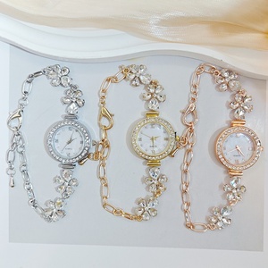 Nuovo Arrivo: Elegante Orologio da <span class=keywords><strong>Donna</strong></span> con Bracciale Floreale Tempestato di Gemme, Movimento al Quarzo, Logo Personalizzabile - Product Image 1