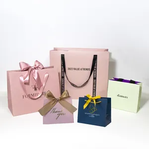 Logo personalizzato manico in nastro di lusso sacchetti di carta regalo abbigliamento Shopping confezioni per matrimoni borse rosa segreti