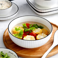 Ensemble de bols et d'assiettes en céramique et porcelaine, sans BPA, écologiques, résistants à la chaleur, durables, étanches, blancs avec bord noir, pour hôtel, restaurant, salle à manger