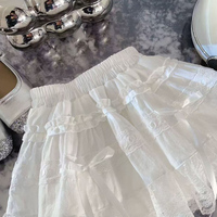Robe d'été 2026 style ballet, jupe courte bouffante en dentelle à volants et nœud, coupe trapèze féminine et amincissante
