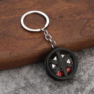 Wholesale Metal Brake Pad Keychain 3d Rotatable Auto Car Keychain Protein Keychain - Product Image 5