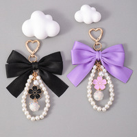 Porte-clés élégant avec nœud en perles, pendentif décoratif pour sac à main pour filles