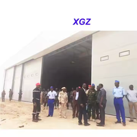 Hangar télescopique pour avions en acier industriel de haute qualité, porte coulissante, hangar pour avions, bâtiment métallique préfabriqué