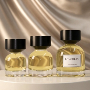 New Arrival Elegant Round Empty perfume <b>Bottle</b> 30Ml 50Ml 100Ml Embossed Base Glass Perfume <b>Bottle</b> With Black Cone‑shaped Cap - Product Image 1