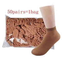 Chaussettes jetables non tissées avec poignée antidérapante Chaussettes à usage unique pour services de location 50 paires/sac Chaussettes couvre-pieds