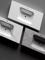 Ensemble de meuble-lavabo de salle de bain ovale monobloc thermoformé en dalle de pierre blanche classique avec support dissimulé sous le comptoir sur mesure