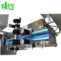 Machine de marquage laser entièrement automatique pour bouchons de bouteilles, avec codage QR, date, lot, collecte de données, tri des défaillances et équipement de traçabilité