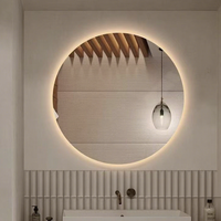 Miroir de salle de bain intelligent LED à trois couleurs, anti-buée, de qualité hôtelière, en verre fabriqué en usine, design minimaliste circulaire