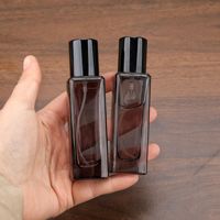 Flacon vaporisateur de parfum unique 30 ml en verre haut de gamme, format voyage, distributeur d'échantillons de parfum vide exquis, forme carrée allongée