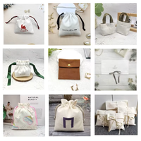 Sac de rangement en coton tissé blanc avec cordon de serrage et ruban vert, pochette personnalisée avec logo imprimé pour emballage de cadeaux et de bijoux