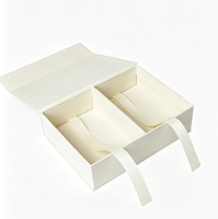Boîte à bijoux élégante en carton blanc crème en forme de livre avec rubans de levage pour montre et bracelet