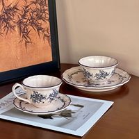 Service de vaisselle en céramique vintage bleu et blanc à motif végétal, comprenant un bol à riz de 4,5 pouces, une tasse à café, une soucoupe et une assiette, réutilisable pour la maison