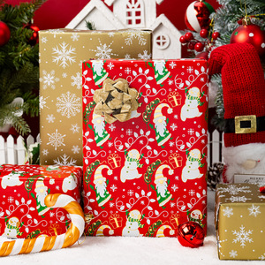 Rollo de Papel de Regalo Navideño Reversible de 17 Pulgadas x 33 Pies, Dorado Metálico con Diseño de Gnomos y Muñecos de Nieve con Copos de Nieve Rojos - Product Image 2