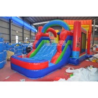Château gonflable commercial neuf pour chiens et structure de jeu combinée à thème de dessin animé avec toboggan, idéal pour les parcs pour enfants