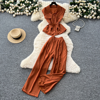 Ensemble pantalon taille haute et pantalon large élégant d'été pour femme, avec haut sans manches à revers boutonné et ceinture, idéal pour le bureau et les trajets quotidiens
