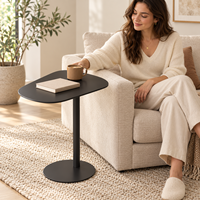 Table basse moderne en fer réglable avec plateau asymétrique