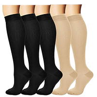 Chaussettes de compression unies mi-hautes, chaussettes de sport élastiques de soutien du mollet pour la course à pied, adaptées aux infirmières