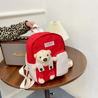Mochila escolar ligera de nailon bonita para niños, Unisex, informal a la moda, con cierre de cremallera, diseño de oso de juguete