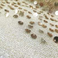 Tissu à paillettes brodé or pour robe de soirée