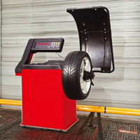 Équilibreur de roue de pneu d'atelier automatique certifié CE 0.2kw équipement de type ascenseur pour l'équilibreur de pneu d'alignement de roue