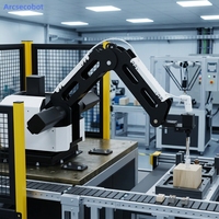 Petit robot avec ventouse pour le placement automatique de pièces sur la chaîne d'assemblage