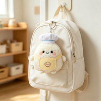 Llavero de Peluche Minimalista Suave y Esponjoso con Diseño de Bola de Arroz y Delantal Amarillo para Mochilas Estéticas y Decoración Creativa de Espacios de Trabajo