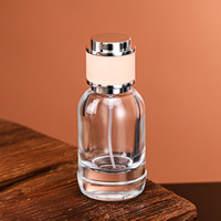 Flacon de parfum vide rond de luxe personnalisé de 25 ml, 50 ml, 100 ml, flacon pulvérisateur en verre, boîte personnalisée