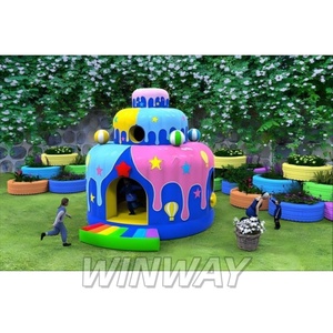 Castillo inflable con temática de pastel azul oscuro y rosa con postre colorido y detalles de globos a la venta - Product Image 3