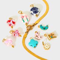 Accessoires en acier au titane de la série de Noël de vente chaude, pendentif fait main en acier inoxydable dégoulinant d'huile colorée