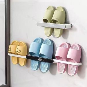 Organisateur de chaussures mural pliable et extensible en plastique, avec petites fentes, pour pantoufles, avec bande adhésive - Product Image 4