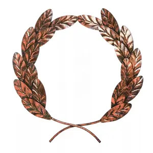 Une couronne décorative en forme de feuille, ornement d'arbre, ornement pour noël, une couronne de porte Antique en cuivre et métal