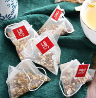 Sachets de thé pyramidaux en nylon thermosoudés en gros pour usine, sachets de thé triangulaires vides avec ficelle et étiquette personnalisée