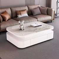 Table basse rectangulaire de style italien de luxe léger avec plateau en roche et tiroirs de rangement en bois massif pour salon