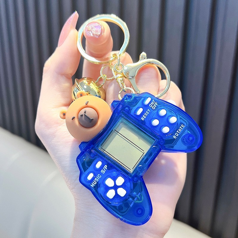 Consola de juegos Capybara con mango transparente-azul
