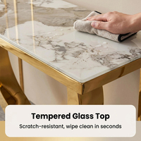 Table à manger en pierre frittée de luxe avec support en acier doré, design moderne pour la maison et l'hôtellerie