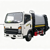 Camion compacteur de déchets Sinotruk HOWO 4x2 à moteur diesel, 8 m³ de capacité, chargement arrière, véhicule de collecte des déchets scellé pour l'élimination municipale